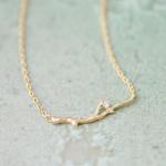 Branch with Crystal necklace in gold