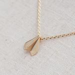 paper airplane necklace in gold