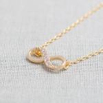 Tiny Infinity Necklace in gold
