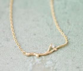 Branch with Crystal necklace in gold